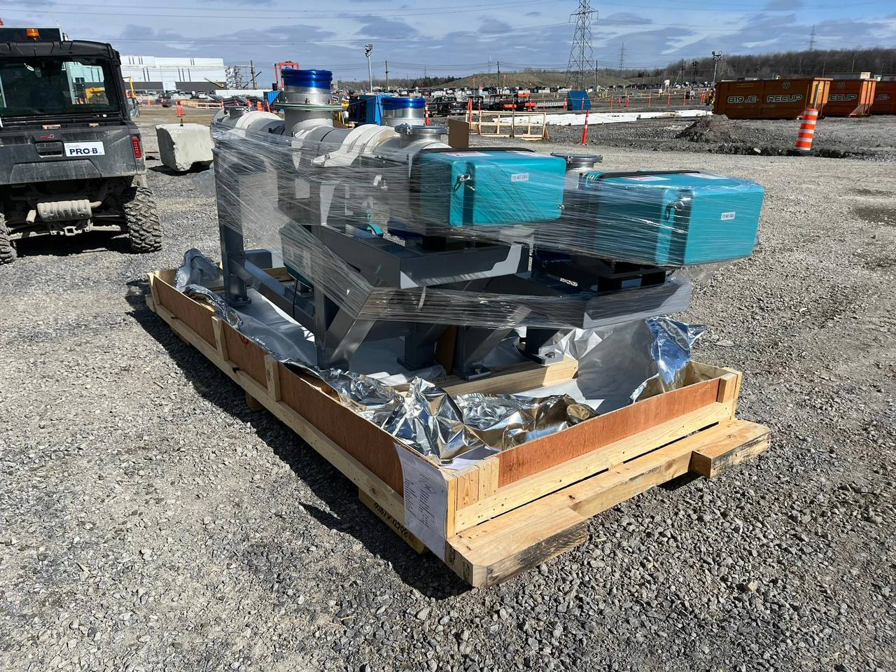 Crated equipment skid delivered to site