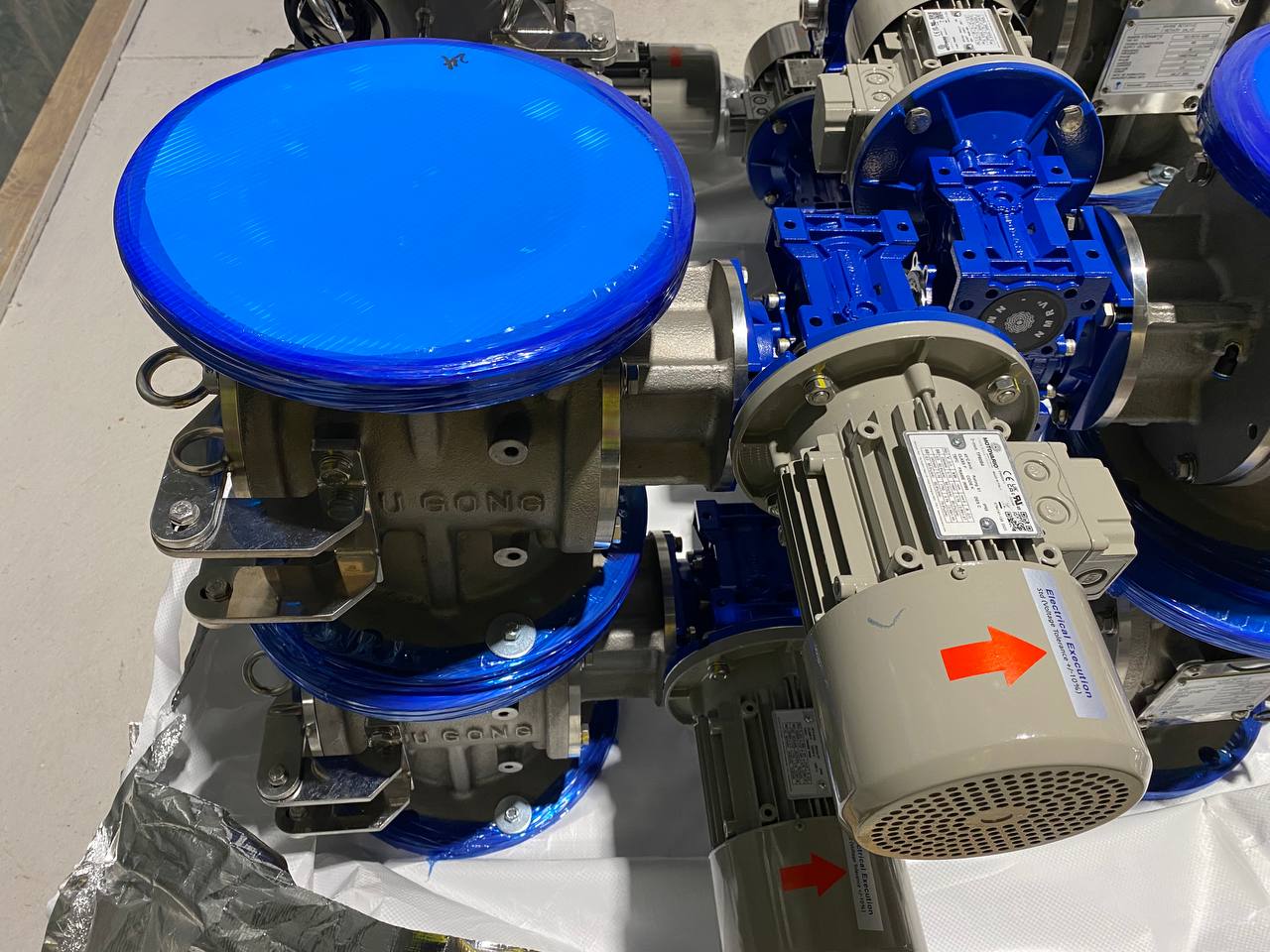 Valves with geared actuators and motors staged for installation